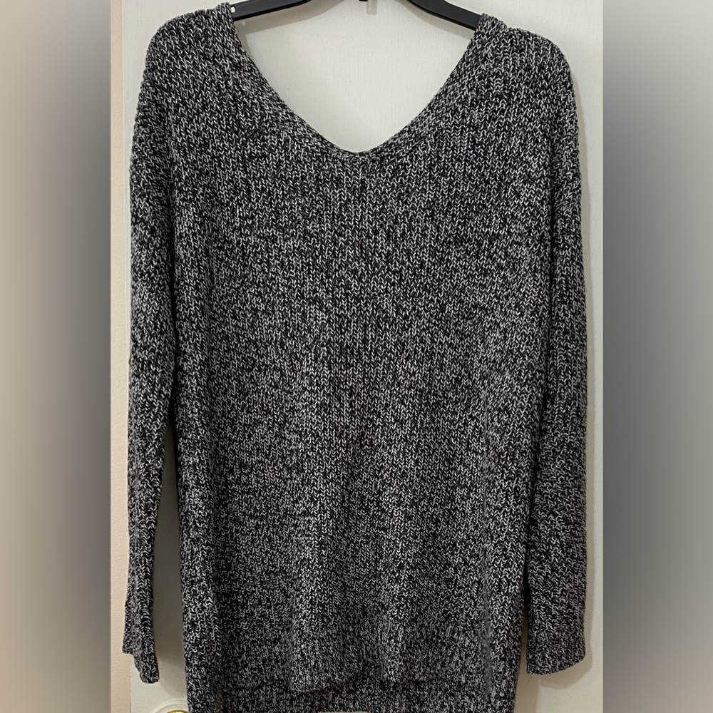 Cute sweater with crisscross cutout in back